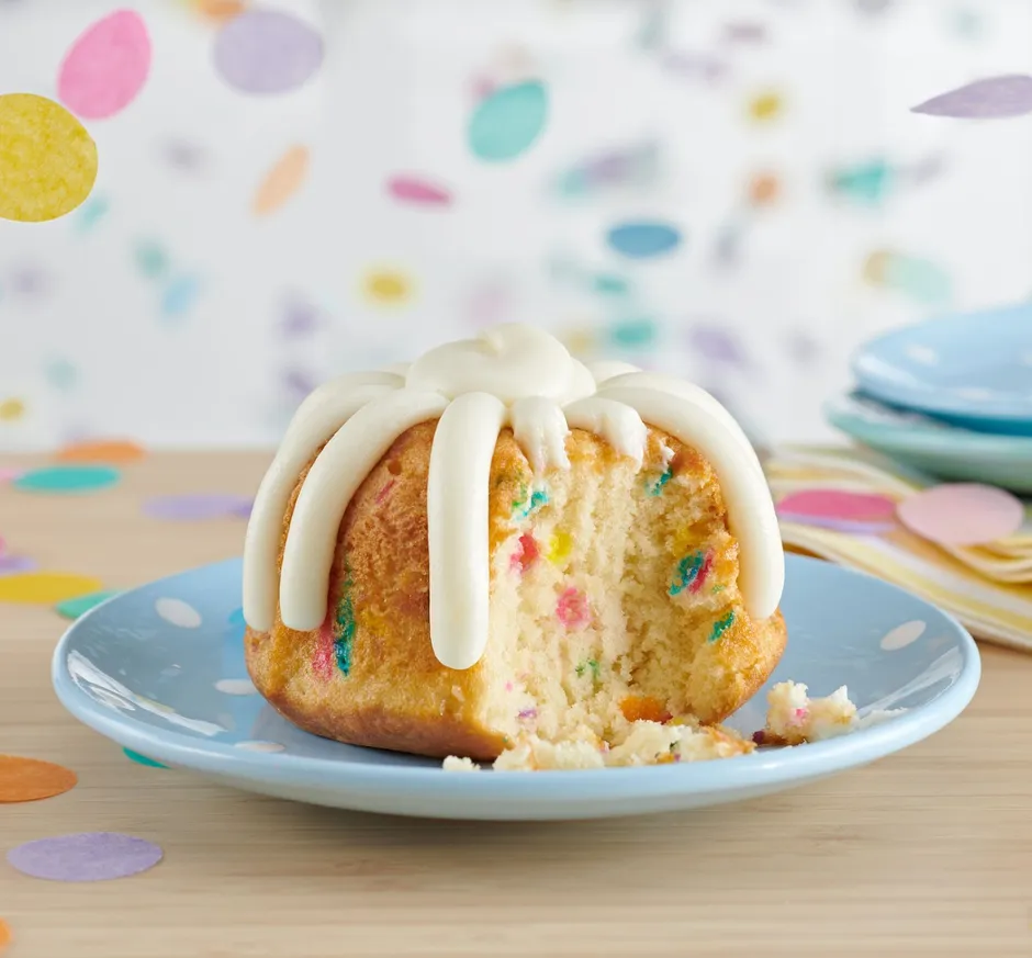 A decorated bundtlet with colored fillings